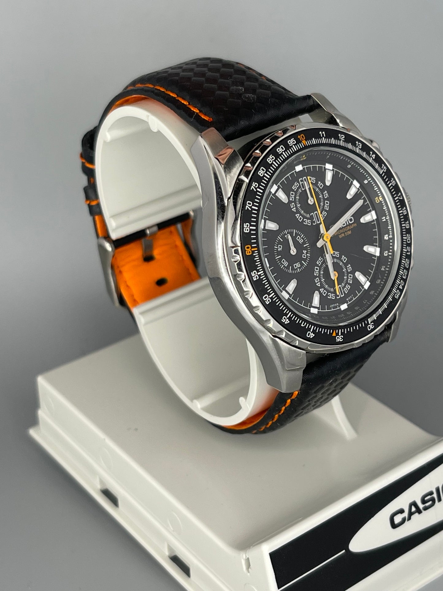 Casio MTP-4500 with upgraded orange strap